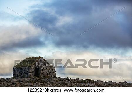 Stock Photograph - Abandoned rock and stone house in rural Iceland; Iceland. Fotosearch