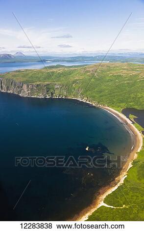 Stock Photo - Aerial view of cliffs and beaches along the shore of Popof Island near Sand Point, Southwestern Alaska, USA, Summer. Fotosearch