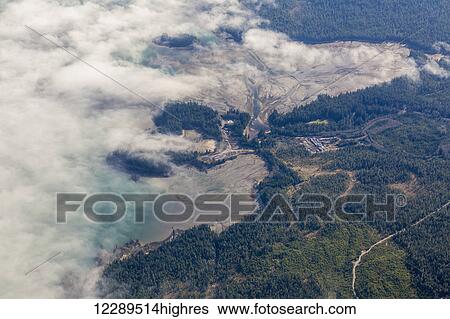 Aerial view of clouds obscuring the mud flats during low tide along the shores of rural Ketchikan, Southeast Alaska, USA, Spring View Large Photo Image Stock Photograph - Aerial view of clouds obscuring the mud flats during low tide along the shores of rural Ketchikan, Southeast Alaska, USA, Spring. Fotosearch