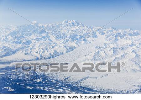 Aerial view of Denali and Mt. Foraker covered in snow with the Buckskin Glacier running into the foreground, Interior Alaska, USA, Winter View Large Photo Image Stock Photograph - Aerial view of Denali and Mt. Foraker covered in snow with the Buckskin Glacier running into the foreground, Interior Alaska, USA, Winter. Fotosearch