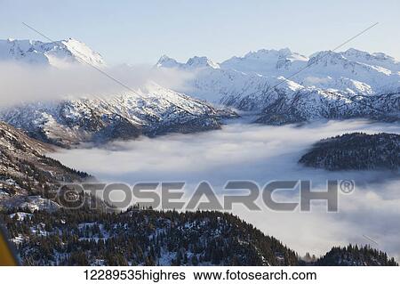 Stock Photograph - aerial view of Kenai Mountains near Homer, Alaska.. Fotosearch
