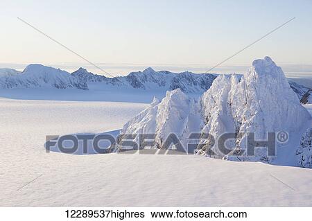 Stock Photograph - Aerial view of Kenai Mountains near Homer, Alaska.. Fotosearch