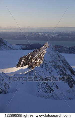Stock Photograph - Aerial view of Kenai Mountains near Homer, Alaska.. Fotosearch