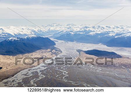 Stock Photograph - Aerial view of low tide and Woronkofski Island in the Stikine River Delta on a clear day, Wrangell, Southeast Alaska, USA, Spring. Fotosearch