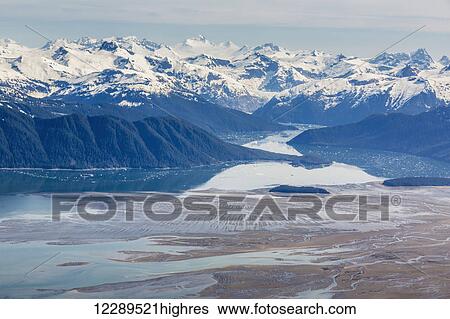Stock Photograph - Aerial view of low tide in the Stikine River Delta on a clear day, Wrangell, Southeast Alaska, USA, Spring. Fotosearch