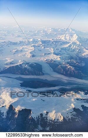 Aerial view of snow covered mountains and glaciers in the Coastal Range, Southeast Alaska, USA, Summer View Large Photo Image Stock Photograph - Aerial view of snow covered mountains and glaciers in the Coastal Range, Southeast Alaska, USA, Summer. Fotosearch