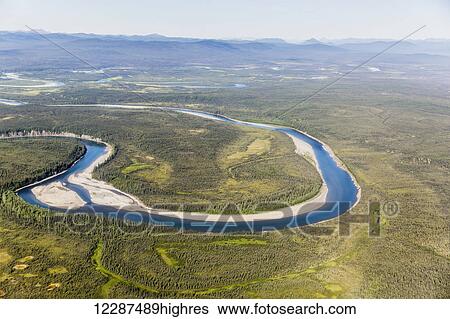 Stock Photograph - Aerial view of the foothills of the Brooks Range junction of the Koyukuk and John Rivers, Brooks Range; Alaska, United States of America. Fotosearch