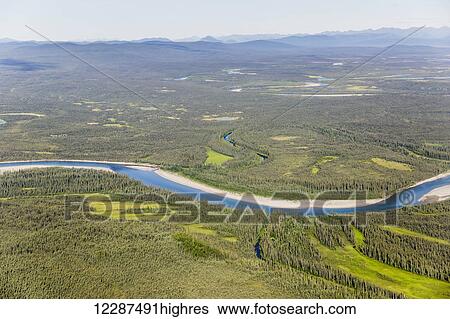 Stock Photograph - Aerial view of the foothills of the Brooks Range junction of the Koyukuk and John Rivers, Brooks Range; Alaska, United States of America. Fotosearch