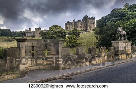 Alnwick Castle with crosses in the stone wall; Alnwick, Northumberland, England View Large Photo Image Stock Photograph - Alnwick Castle with crosses in the stone wall; Alnwick, Northumberland, England. Fotosearch