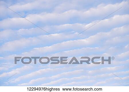 Stock Photograph - Altocumulus clouds; Ontario, Canada. Fotosearch