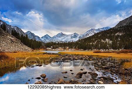 Stock Photograph - Amazing Landscape, Beautiful Mountain Sunset. Fotosearch