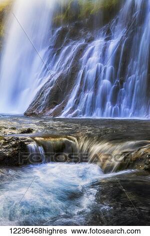 Stock Photograph - An unnamed waterfall on the Snaefellsness Peninsula; Iceland. Fotosearch