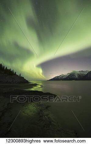 Aurora Borealis dancing above the Chugach Mountains and Turnagain Arm, Kenai Peninsula, Southcentral, Alaska View Large Photo Image Stock Photograph - Aurora Borealis dancing above the Chugach Mountains and Turnagain Arm, Kenai Peninsula, Southcentral, Alaska. Fotosearch