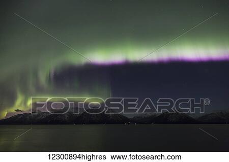 Aurora Borealis dancing above the Chugach Mountains and Turnagain Arm, Kenai Peninsula, Southcentral, Alaska View Large Photo Image Stock Photograph - Aurora Borealis dancing above the Chugach Mountains and Turnagain Arm, Kenai Peninsula, Southcentral, Alaska. Fotosearch