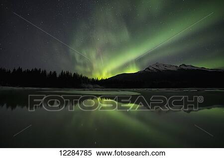 Stock Photography - Aurora Borealis (Northern Lights), Mendenhall River, Tongass National Forest; Juneau, Alaska, United States of America. Fotosearch
