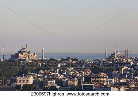 Stock Photograph - Aya Sofia and Blue Mosque in Sultanahmet, old city; Istanbul, Turkey. Fotosearch