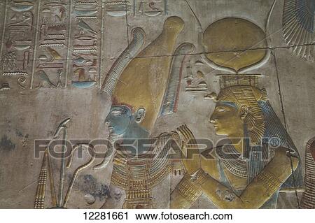 Bas-relief, Ramses II (left), Goddess Hathor (right), Temple of Seti I; Abydos, Egypt View Large Photo Image Stock Image - Bas-relief, Ramses II (left), Goddess Hathor (right), Temple of Seti I; Abydos, Egypt. Fotosearch
