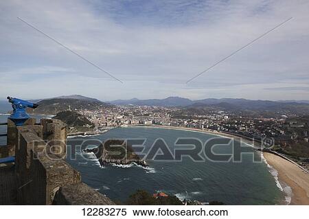 Stock Photography - Bay of La Concha beach and the Island of Santa Clara; San Sebastian, Spain. Fotosearch