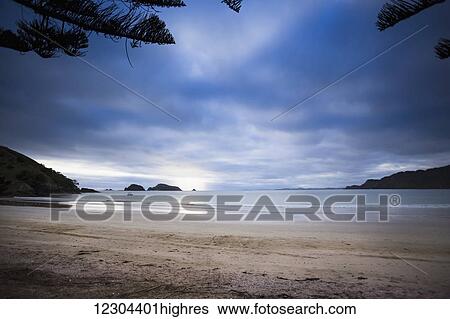 Beachfront camping in Matauri Bay; Northland, New Zealand View Large Photo Image Stock Photograph - Beachfront camping in Matauri Bay; Northland, New Zealand. Fotosearch