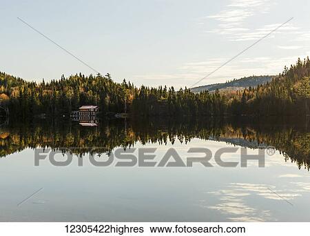 Beautiful landscape reflection; Baie-Sainte-Catherine, Quebec, Canada View Large Photo Image Stock Photograph - Beautiful landscape reflection; Baie-Sainte-Catherine, Quebec, Canada. Fotosearch