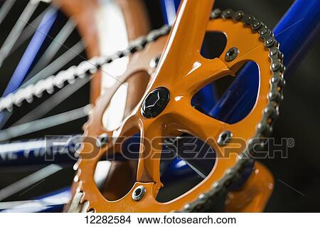 Picture - Bicycle chain and crank, close up; Winnipeg, Manitoba, Canada. Fotosearch