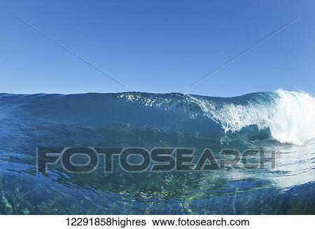 Blue Ocean Wave, View from in the Water View Large Photo Image Stock Photograph - Blue Ocean Wave, View from in the Water. Fotosearch