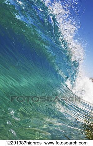 Blue Ocean Wave, View from in the Water View Large Photo Image Stock Photograph - Blue Ocean Wave, View from in the Water. Fotosearch