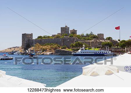 Stock Photograph - Boats in the port and Turkish flag; Bodrum, Turkey. Fotosearch