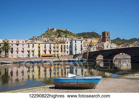 Stock Photograph - Bosa and Serravalle's Castle as seen from the River Temo; Sardinia, Italy. Fotosearch