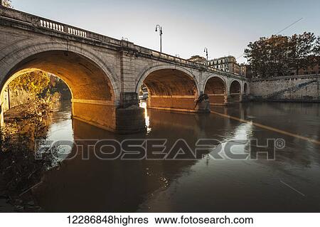 Stock Photograph - Bridge over a river; Rome, Italy. Fotosearch