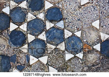 Broken tile in the shape of stars on the ground; Philippi, Greece View Large Photo Image Stock Photograph - Broken tile in the shape of stars on the ground; Philippi, Greece. Fotosearch