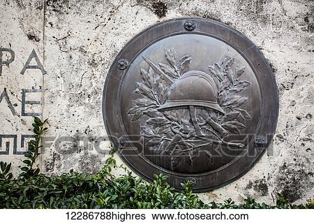 Bronze shield on the wall of the Tomb of the Unknown Solider, Parliament of Greece; Athens, Greece View Large Photo Image Stock Photograph - Bronze shield on the wall of the Tomb of the Unknown Solider, Parliament of Greece; Athens, Greece. Fotosearch