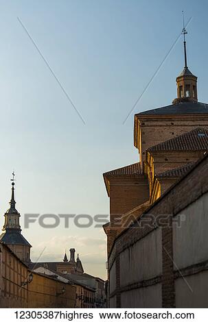 Stock Photograph - Buildings in downtown Alcala de Henares, a historical and charming city near to Madrid; Alcala de Henares, Spain. Fotosearch