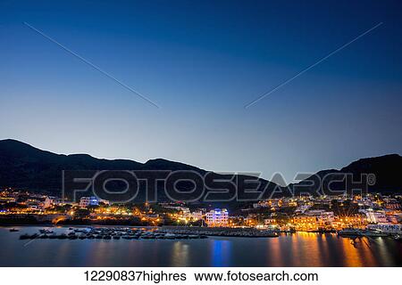 Stock Photograph - Cala Gonone at night; Cala Gonone, Sardinia, Italy. Fotosearch