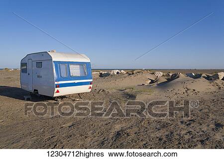 Camping trailer on a beach; Camargue, Provence, France View Large Photo Image Stock Photograph - Camping trailer on a beach; Camargue, Provence, France. Fotosearch