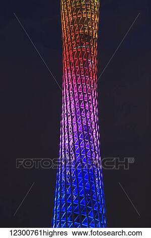 Stock Photograph - Canton Tower with colourful illumination at nighttime; Guangzhou, China. Fotosearch