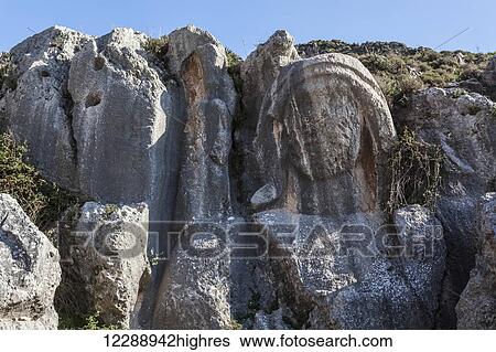 Carving in a rugged rock cliff; Antioch, Turkey View Large Photo Image Stock Photograph - Carving in a rugged rock cliff; Antioch, Turkey. Fotosearch