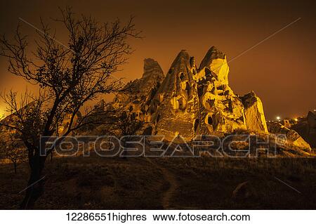 Cave homes in rock formations and fairy chimneys; Goreme, Cappadocia, Turkey View Large Photo Image Stock Photograph - Cave homes in rock formations and fairy chimneys; Goreme, Cappadocia, Turkey. Fotosearch