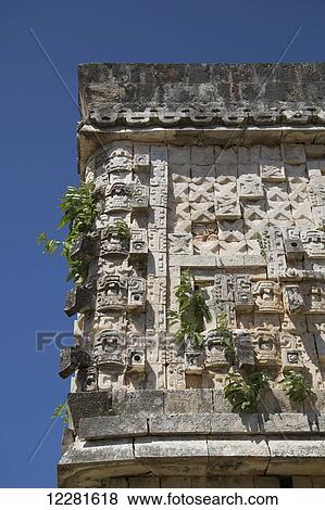 Stock Photo - Chac Rain God stone masks, Palace of the Governor, Uxmal Mayan archaeological site; Yucatan, Mexico. Fotosearch