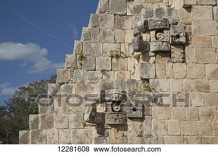 Chac Rain God stone masks, Pyramid of the Magician, Uxmal Mayan archaeological site; Yucatan, Mexico View Large Photo Image Stock Photo - Chac Rain God stone masks, Pyramid of the Magician, Uxmal Mayan archaeological site; Yucatan, Mexico. Fotosearch