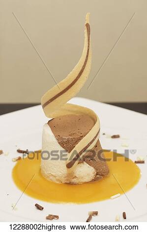 Stock Photograph - Chocolate mousse with wafer and orange sauce; Ankara, Turkey. Fotosearch