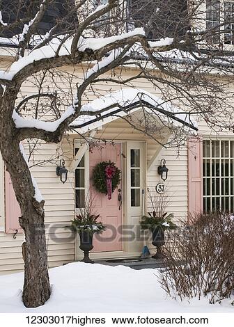 Christmas wreath on front door of house; Knowlton, Quebec, Canada View Large Photo Image Stock Photograph - Christmas wreath on front door of house; Knowlton, Quebec, Canada. Fotosearch