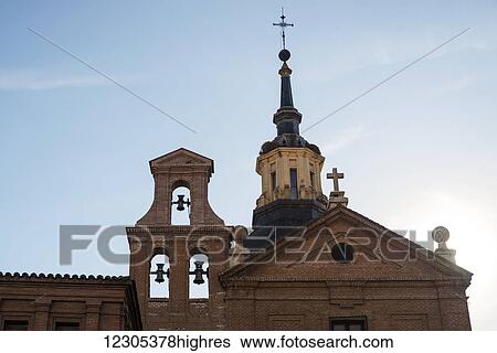 Stock Photograph - Church building in historical downtown Alcala de Henares, a historical and charming city near to Madrid; Alcala de Henares, Spain. Fotosearch