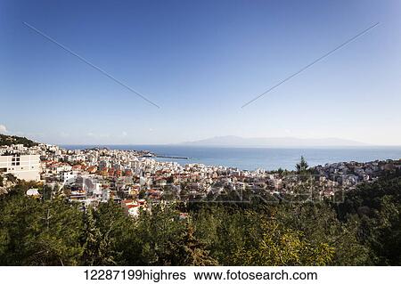 Stock Photograph - Cityscape and harbour of Kavala; Kavala, Greece. Fotosearch