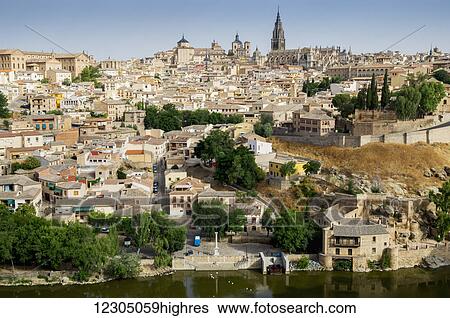 Cityscape of the historic city of Toledo; Toledo, Castile-La Mancha, Spain View Large Photo Image Stock Photograph - Cityscape of the historic city of Toledo; Toledo, Castile-La Mancha, Spain. Fotosearch