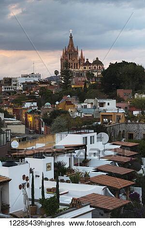 Stock Photograph - Cityscape with parish church; San Miguel de Allende, Guanajuato, Mexico. Fotosearch