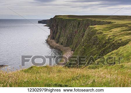 Stock Photograph - Cliffs along the coastline of Duncansby Head; John O'Groats, Scotland. Fotosearch