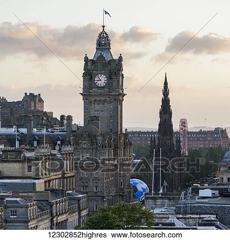 Stock Photograph - Clock tower at sunset; Edinburgh, Scotland. Fotosearch