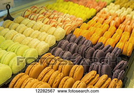 Close up of colourful macaroons in a bakeries display case; Morlaix, Brittany, France View Large Photo Image Stock Photo - Close up of colourful macaroons in a bakeries display case; Morlaix, Brittany, France. Fotosearch