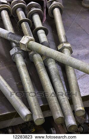 Close up of large bolts with nuts at an electrical power plant, Sand Point, Southwestern Alaska, USA View Large Photo Image Stock Image - Close up of large bolts with nuts at an electrical power plant, Sand Point, Southwestern Alaska, USA. Fotosearch
